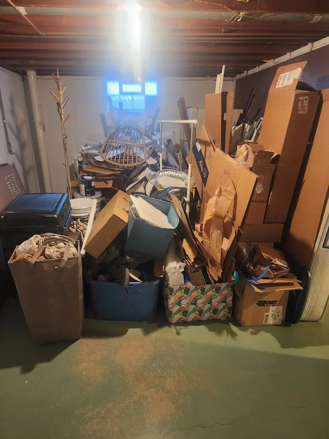 Roll-off dumpster container at job site for Concrete Dumpster Rental in Coshocton